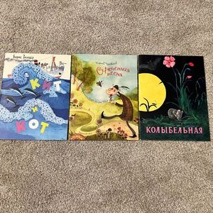 Set of three paperback children's books in Russian